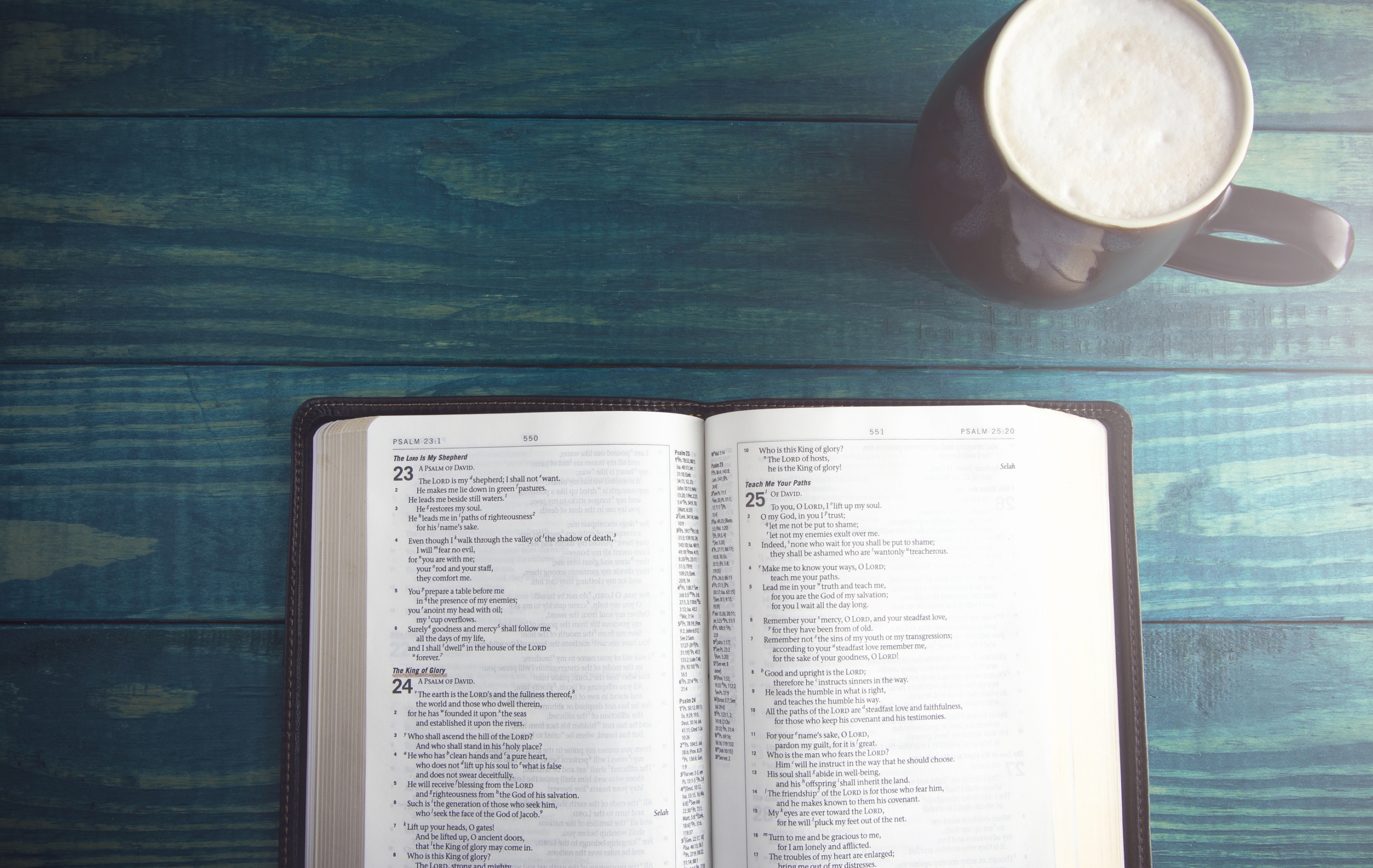 open-bible-on-wood-table open-bible-on-wood-table